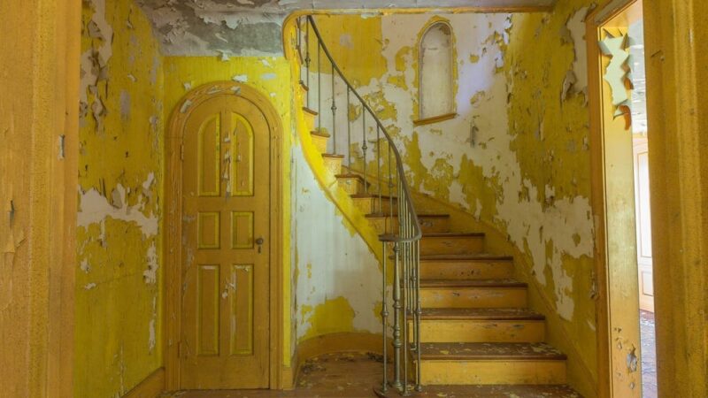 Take a look inside an abandoned 'clown house,' an eerie home one photographer says he'll never forget